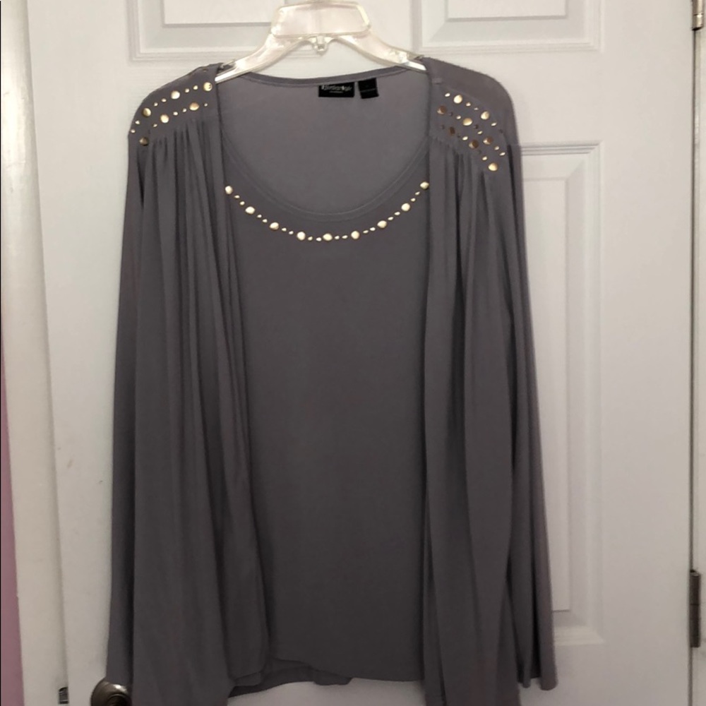 Light grey one piece top with studs.